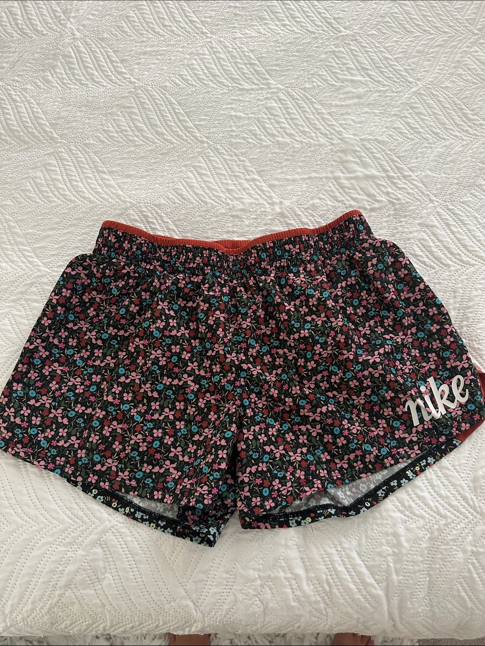 Nike Black Floral Athletic Shorts with Pink & Teal Flowers
